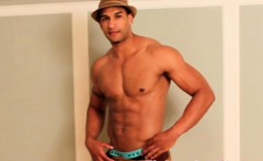 Ebony gay muscle hunk tugs his dong