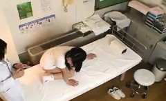 Pigtailed Oriental teen has her doctor examining her delici