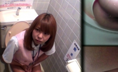 Uniformed asian peeing