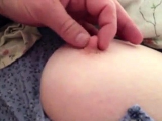 sneaky peep at her big boob as she napps.