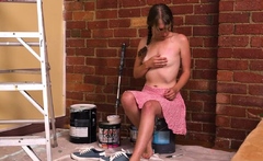 Hairy babe paints the wall and masturbates