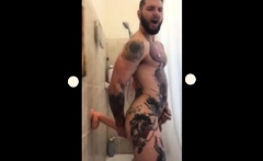 Tatted Hunk Fucks Dildo in Shower Until He Cums