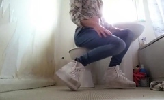 Crossdresser in tight Jeans and Sneakers