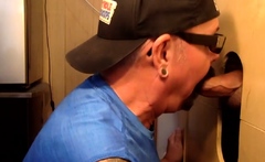 Gray DILF giving head to gloryhole top