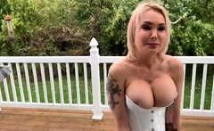 Blonde babe Lesley Solo in the Backyard
