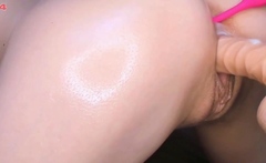 A close up slut fucking a thick dildo